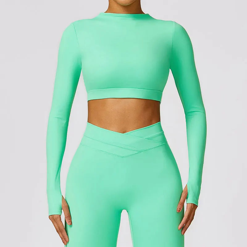 A Blusa Cropped Manga Longa é perfeita para os seus treinos! Com design moderno e tecido de alta qualidade, essa blusa oferece conforto e liberdade de movimento. Ideal para quem busca estilo e praticidade durante a prática de atividades físicas. Adquira já a sua! 