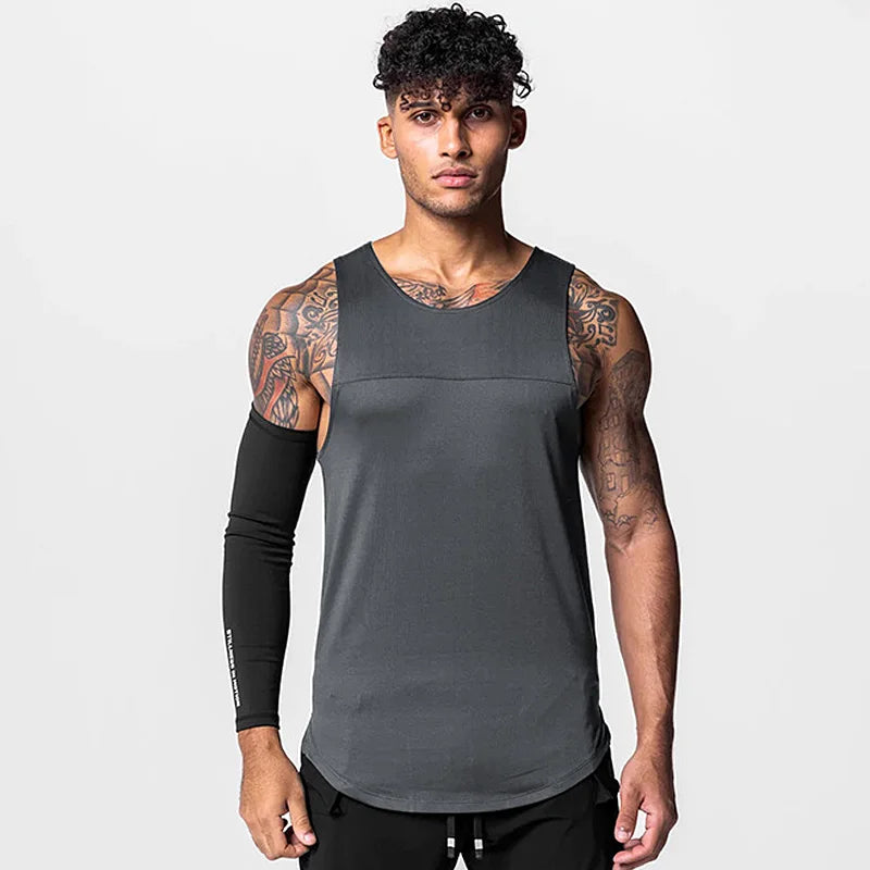 Desenvolvida para treinos intensos, a Camisa Regata Duo Color é ideal para homens que buscam por conforto e performance. Seu design inovador com duas cores é perfeito para quem gosta de se destacar na academia. Feita com tecido de alta qualidade, garante respirabilidade e liberdade de movimento.