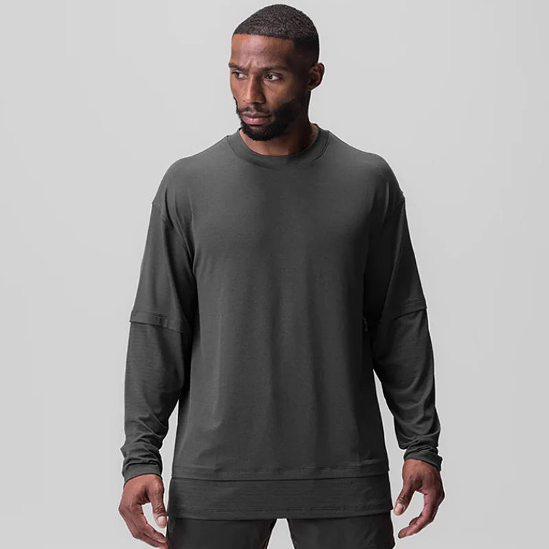 A Camisa Manga Longa de Treino é perfeita para seu treino diário. Feita com tecido de alta qualidade, é confortável e durável. Com seu design moderno, garante liberdade de movimento e respirabilidade. Ideal para atletas exigentes, oferece praticidade e estilo em um só produto.