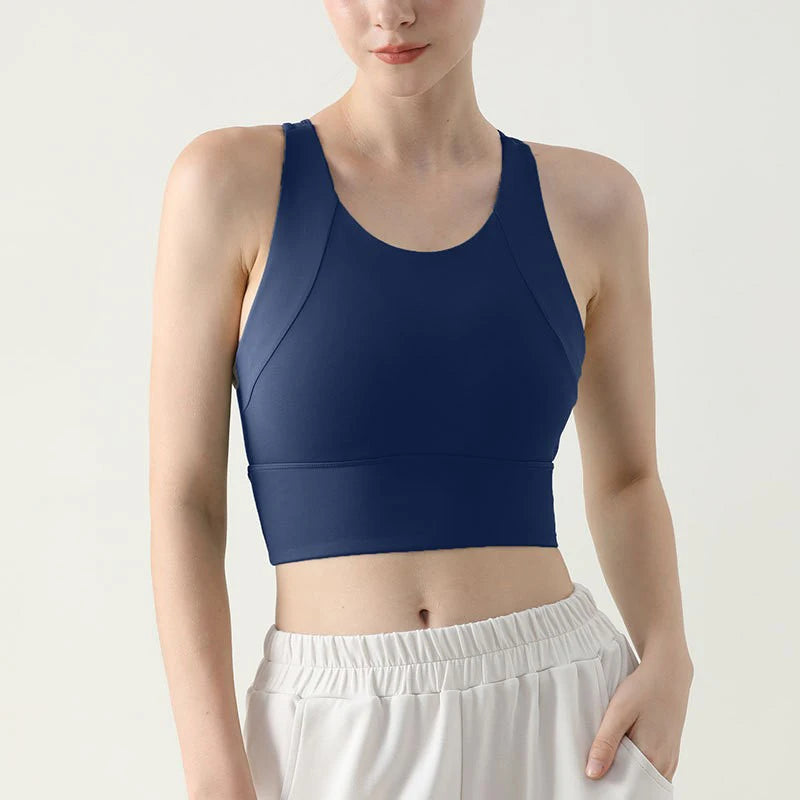 O Top Fitness Esportivo Feminino é perfeito para te acompanhar nos treinos de academia e corrida. Feito com um tecido respirável, mantém você confortável e fresca durante as atividades físicas. Com esse top, você terá o suporte necessário para se sentir poderosa e confiante em cada movimento.