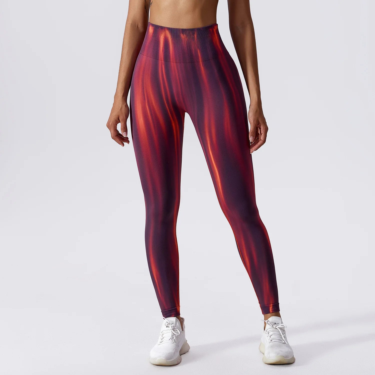 A Calça Legging Tie-Dye na Vertical combina conforto e estilo em uma peça. Feita com tecido macio e durável, apresenta estampa tie-dye em um padrão vertical que alonga a silhueta e traz uma dose extra de personalidade para o look. Ideal para compor looks modernos e cheios de atitude.